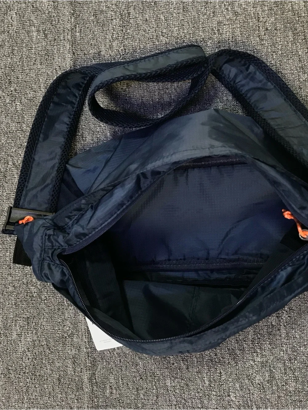 Patagonia Navy Blue Crossbody Travel Bag with Orange Accents